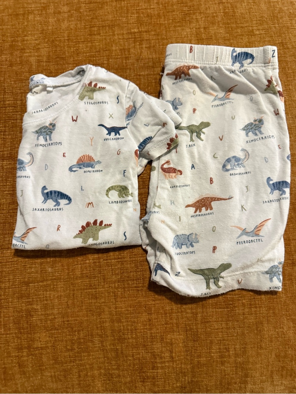 Angel Dear White Dinosaur Pajama Set with Blue, Green, Orange and Tan Prints